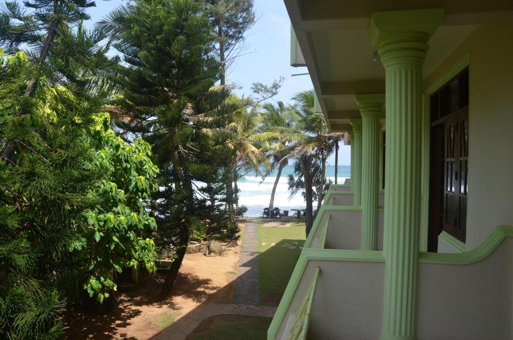 Time N Tide Beach Resort Hikkaduwa Quarto foto