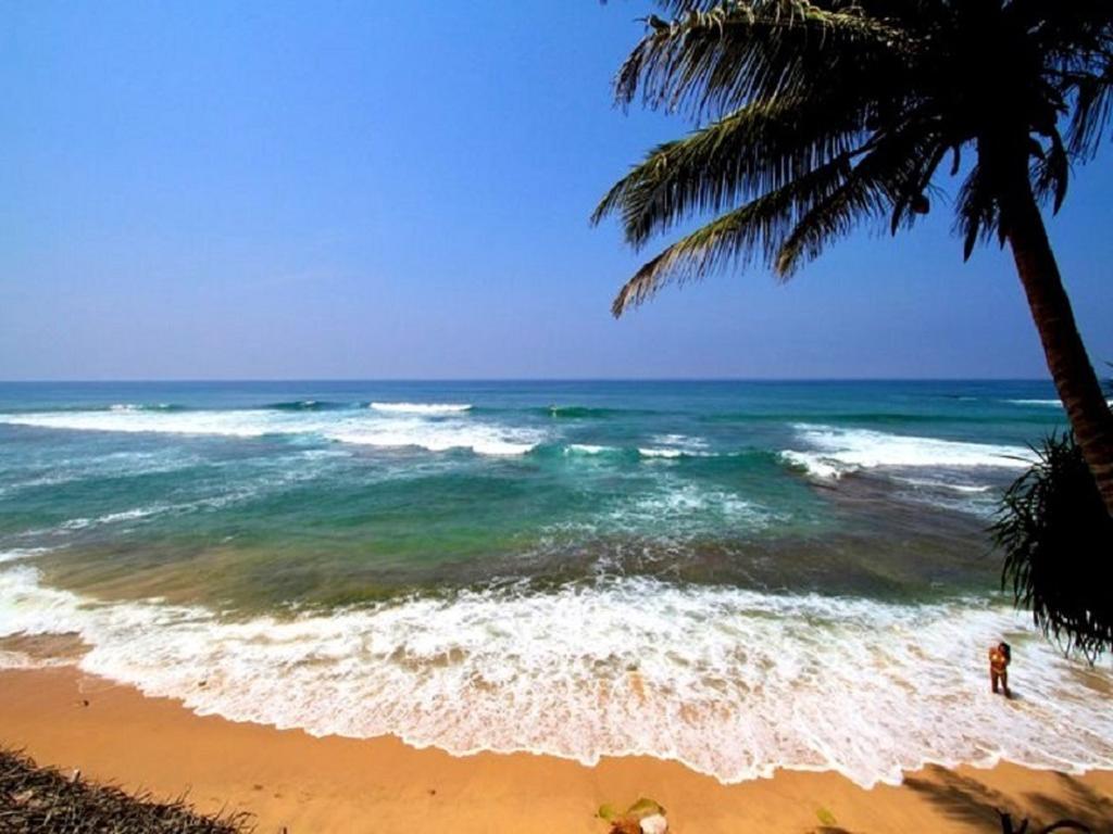 Time N Tide Beach Resort Hikkaduwa Exterior foto